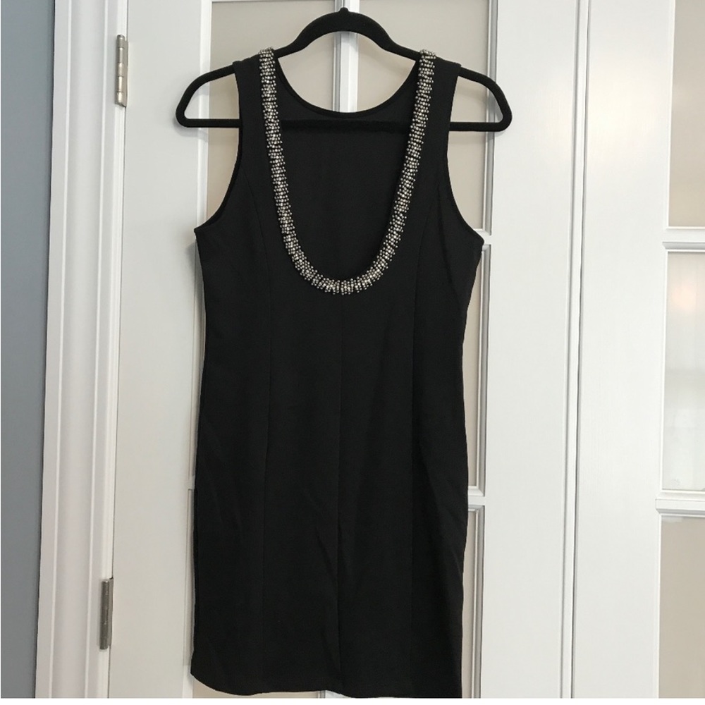 Elodie Black Dress NWT size M.  Love the back!!❤️
